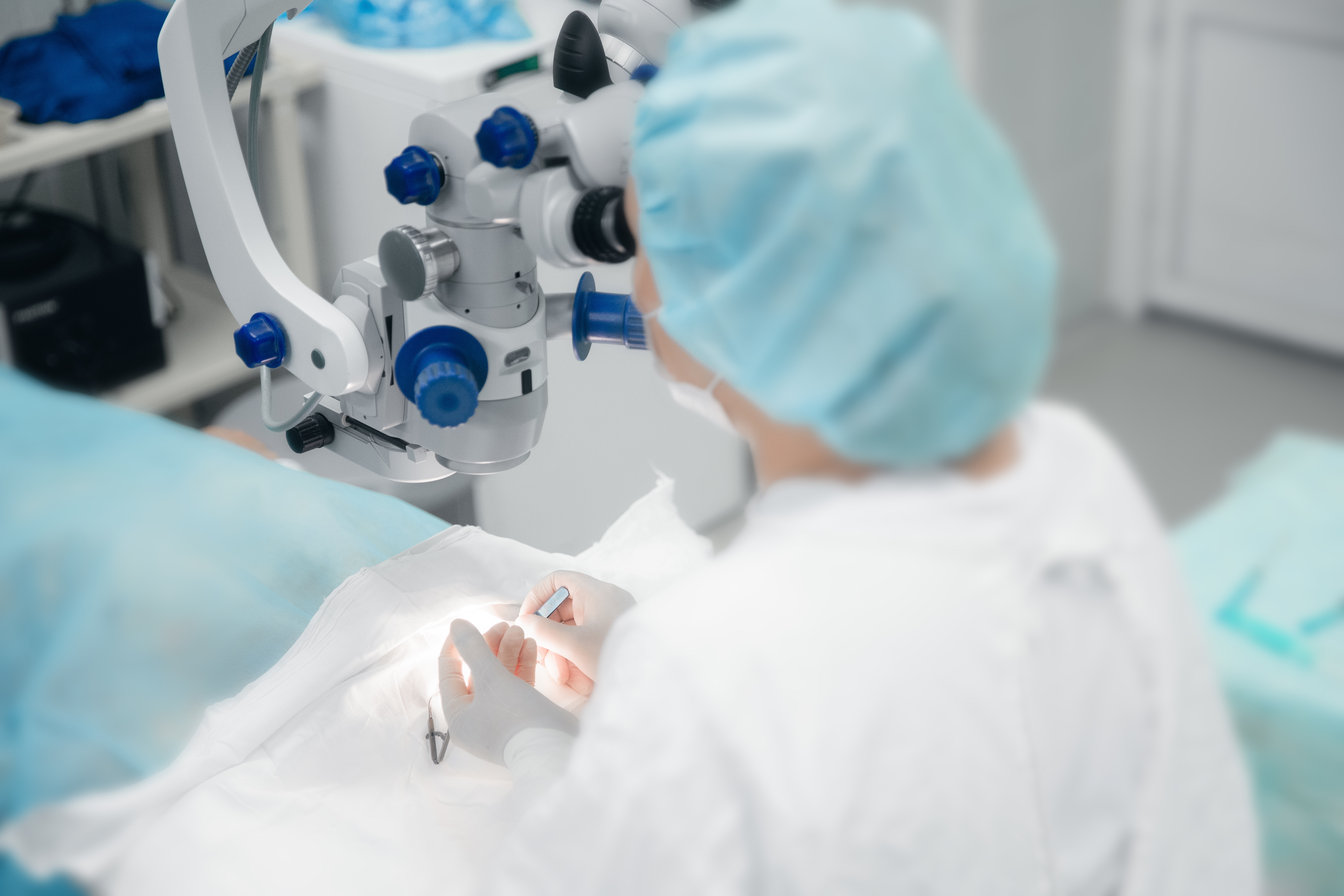 A doctor carrying out a LASIK procedure