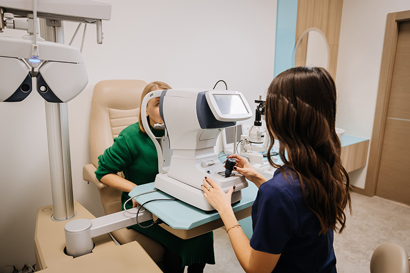 A patient receiving a pre-LASIK eye evaluation